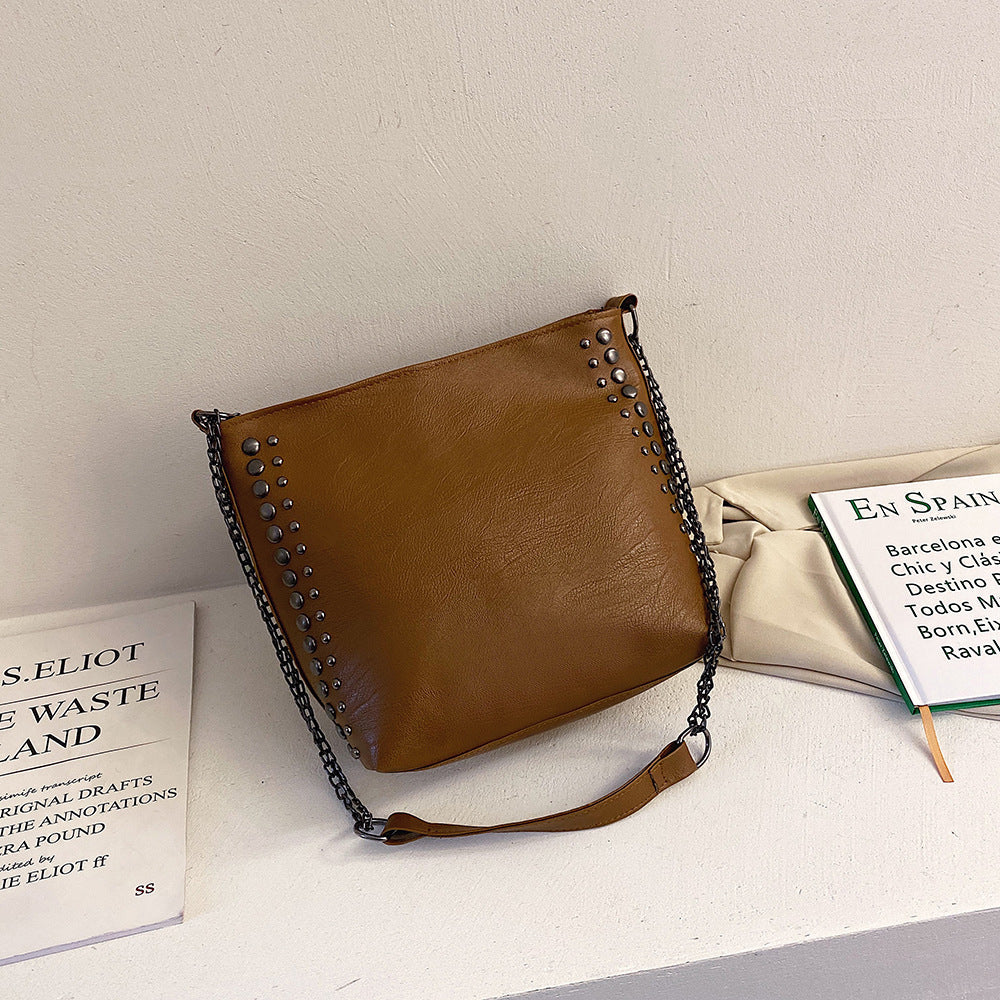 Winter new female bag retro style large capacity one-shoulder bucket bag soft leather rivet messenger bag mySite